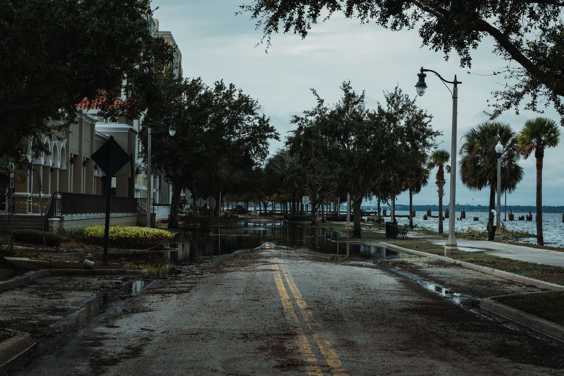 A flooded city street under a grey sky — the kind of disruption an ISMS continuity control was never scoped to cover.