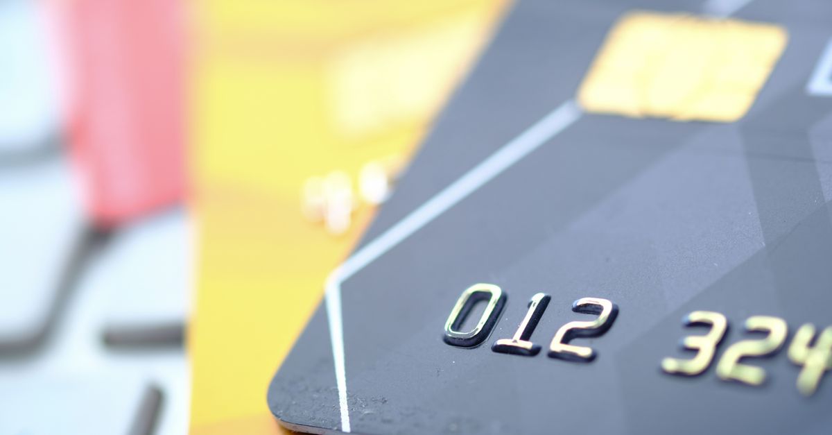 Close-up of credit and debit cards — the cardholder data PCI DSS compliance is built to protect.